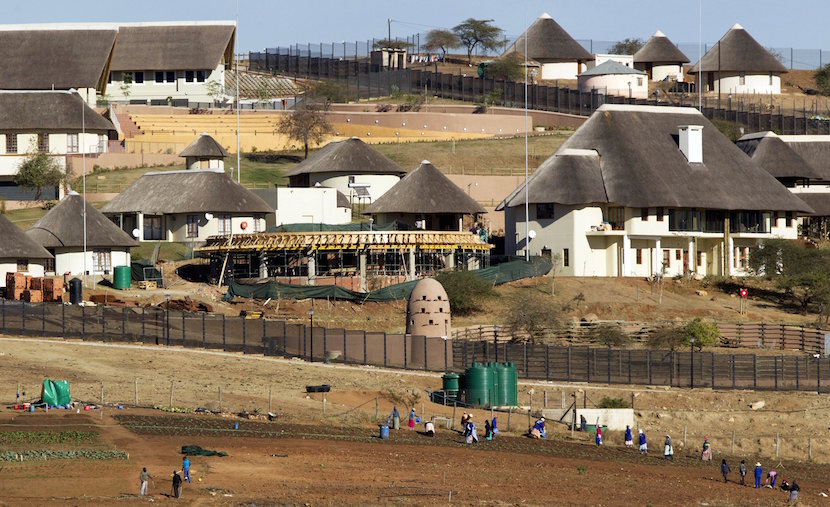 A general view of the Nkandla home (behind the huts) of South Africa's President Jacob Zuma in Nkandla in this August 2, 2012 file photo. REUTERS/Rogan Ward