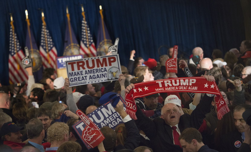 Attendees celebrate winning the New Hampshire primary during a primary watch party for Donald Trump, president and chief executive of Trump Organization Inc. and 2016 Republican presidential candidate, in Manchester, New Hampshire, U.S., on Tuesday, Feb. 9 , 2016. Trump re-assumed his front-runner status in the Republican nominating contest after finishing second in the Iowa caucuses on Feb. 1 to Texas Senator Ted Cruz, despite leading state and national polls for months. Photographer: Victor J. Blue/Bloomberg